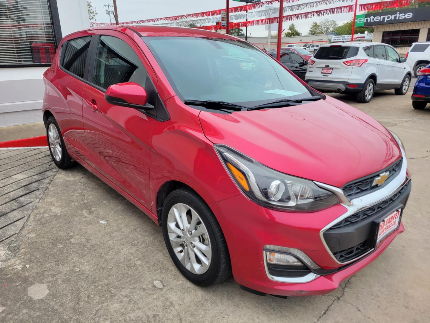 2020 Red Chevrolet Spark 1LT Manual (KL8CC6SA6LC) with an 1.4L L4 16V DOHC engine, 5 Speed Manual transmission, located at 503 West Court, Seguin, TX, 78155, (830) 379-3373, 29.568621, -97.969803 - Photo#1